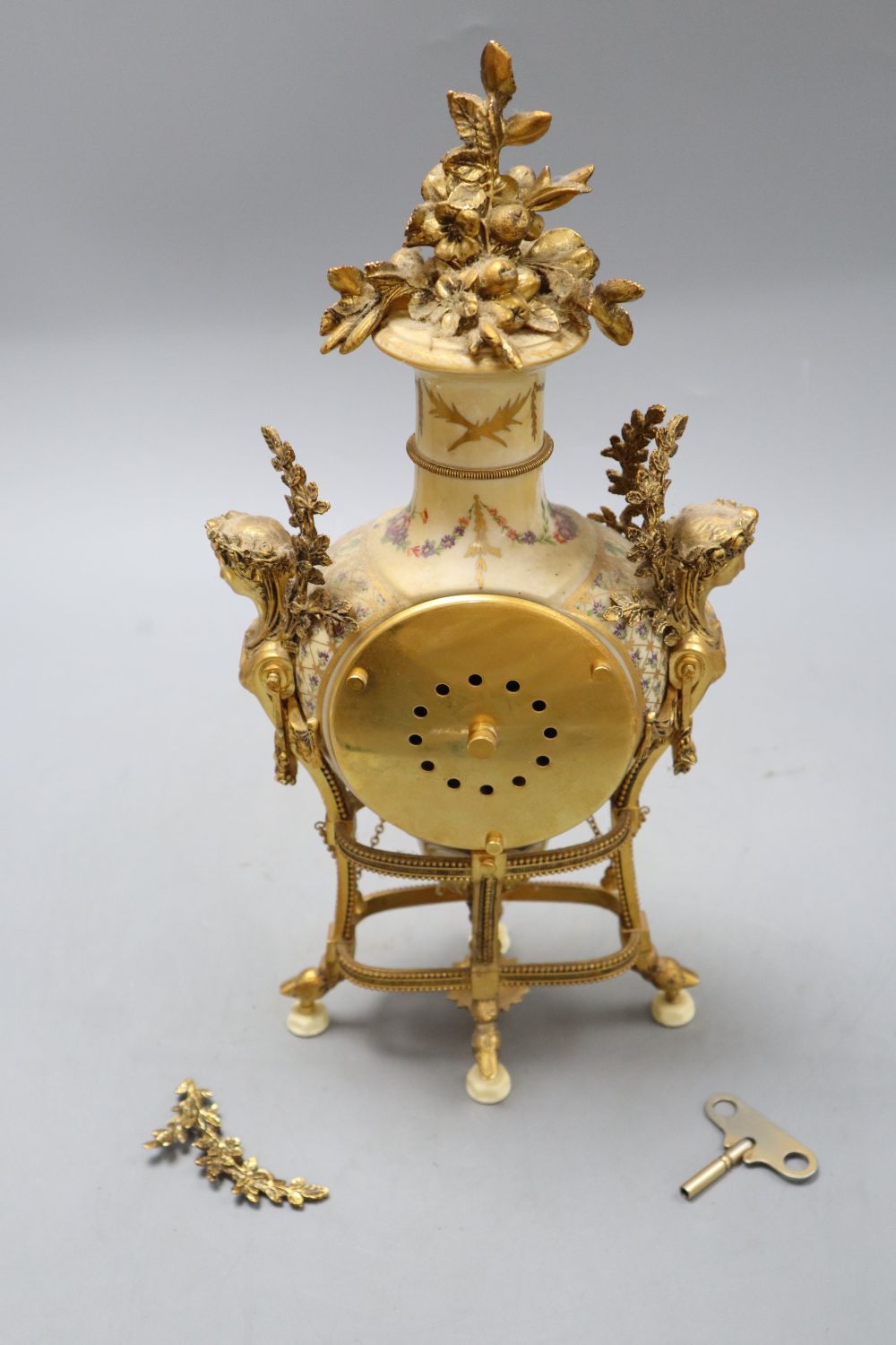 A Victoria & Albert Marie Antoinette mantel clock, height 38cm